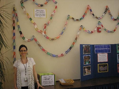 HHS Intern and Practicum students show off a display 